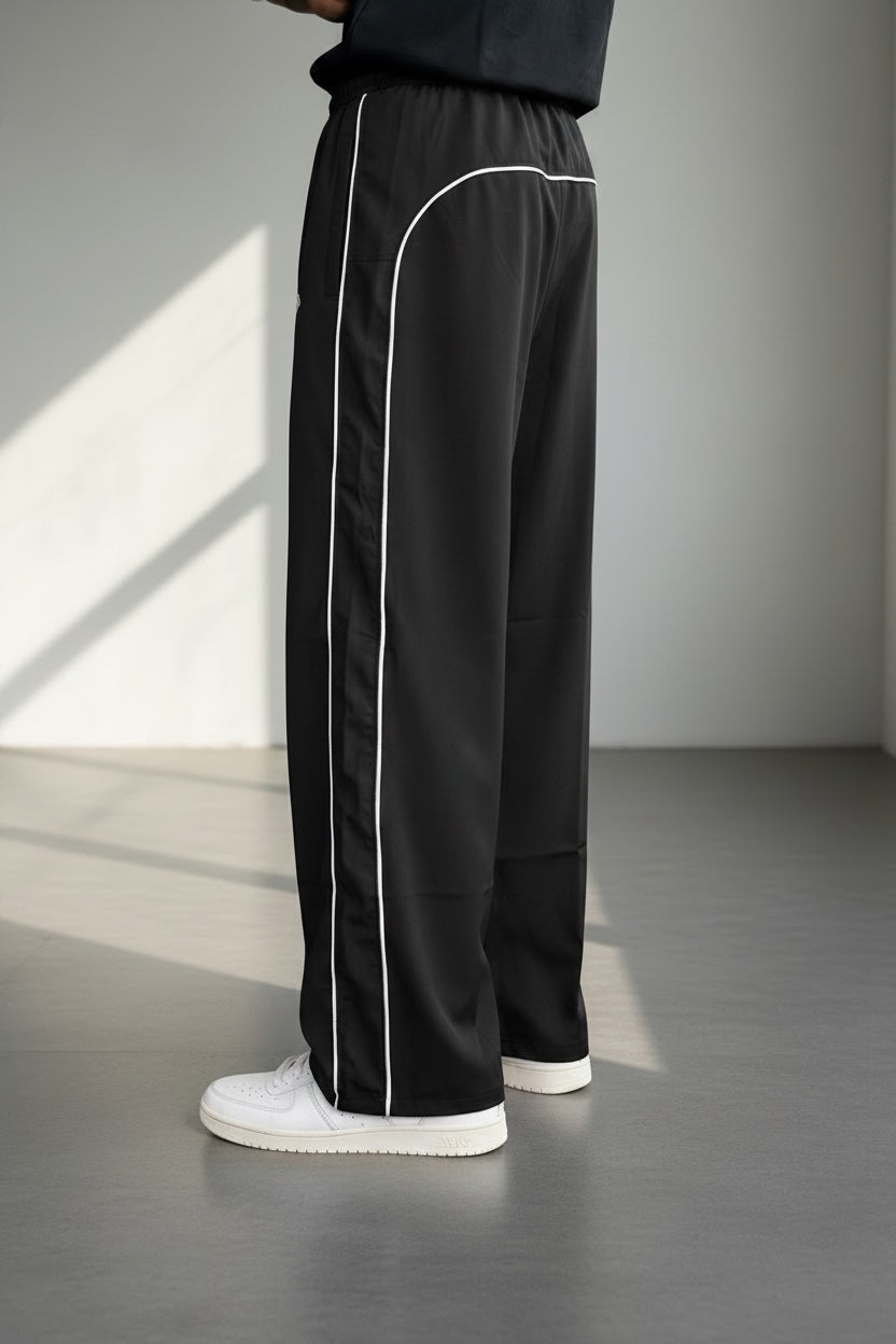 PIPING LOOSE FIT TRACK PANTS-BLACK